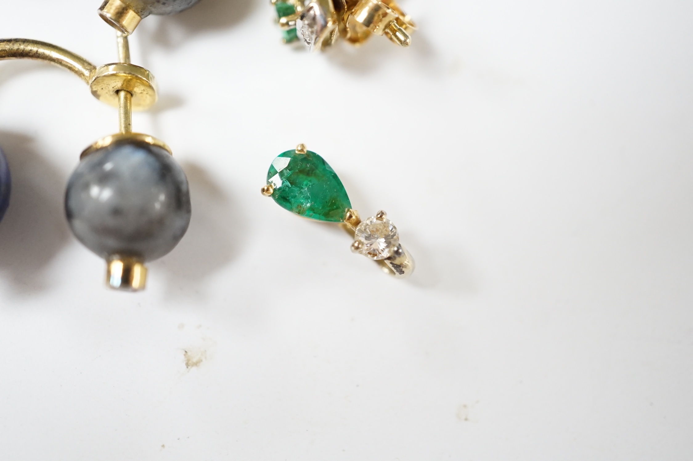 A modern small pair of yellow metal, emerald and diamond set ear studs, a similar pendant and a pair of lapis lazuli, hardstone and diamond chip set ear studs. Condition - fair